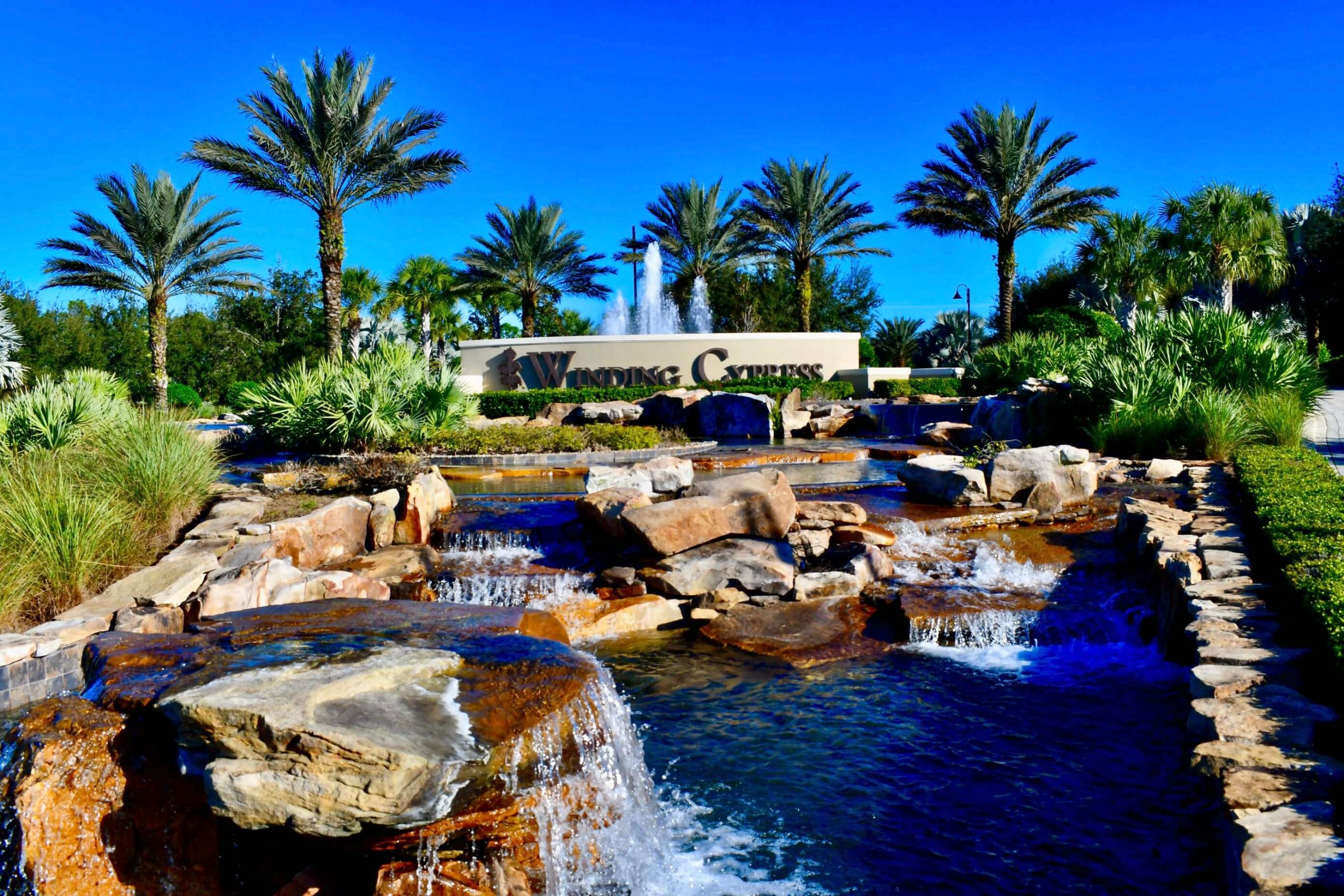 Beautiful Waterfall Feature to Winding Cypress in Naples, FL